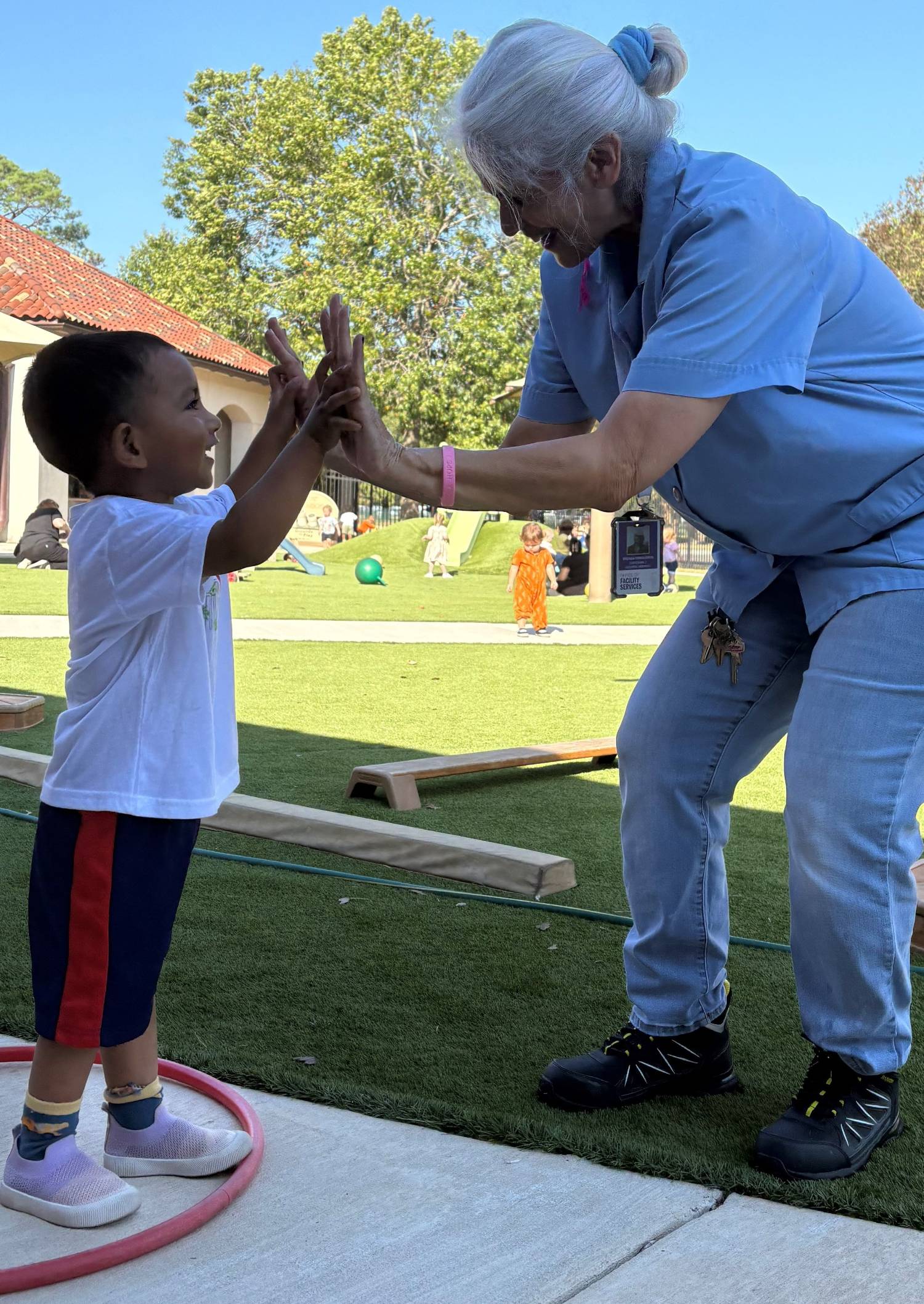 Brenda Finkelstein high-fives a student