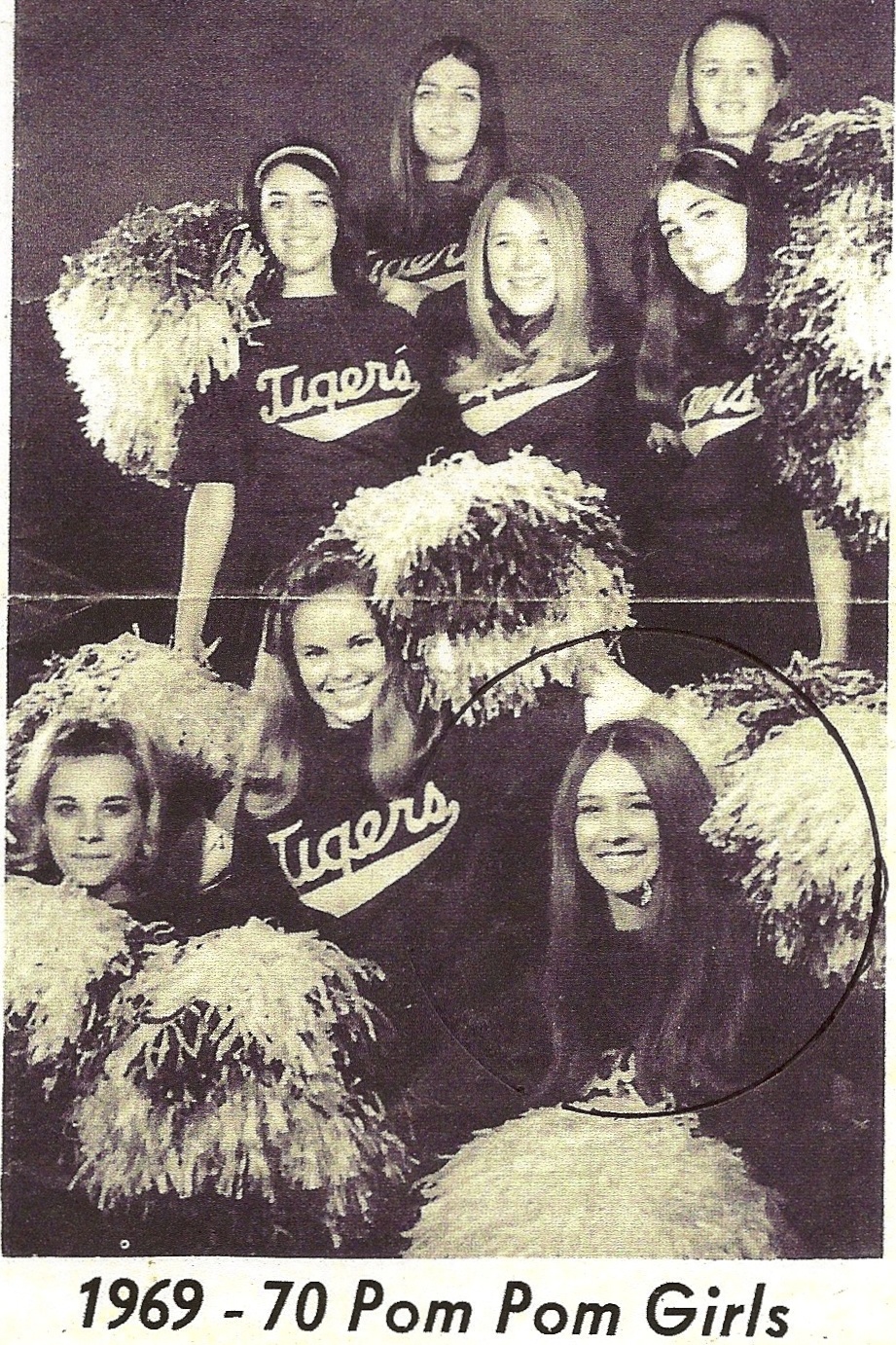 Pat Curtis Bodin smiles with the former LSU pom pom girls